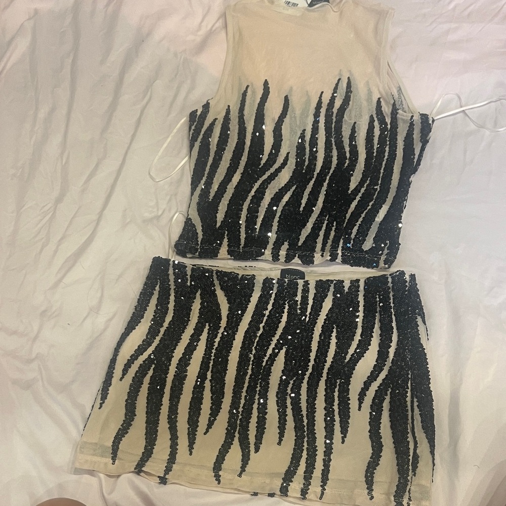 Tenshoppe Sequin black and nude mini skirt and top set by Blanc